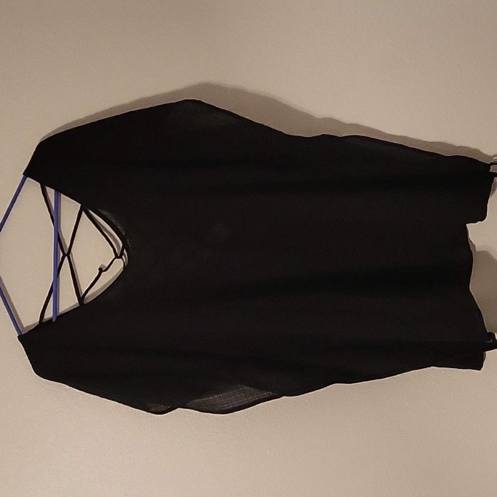 Black long swim suit cover up. Sides are not open.